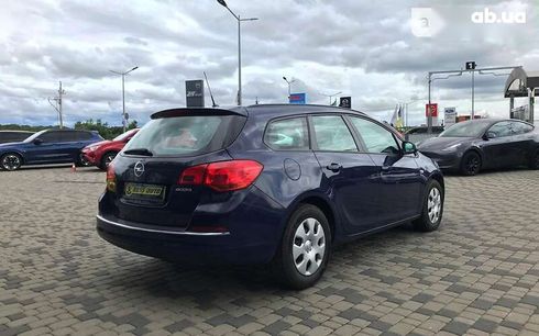 Opel Astra 2014 - фото 8