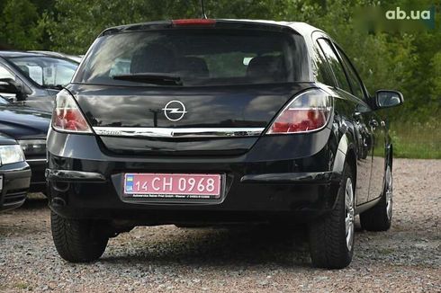 Opel Astra 2009 - фото 11