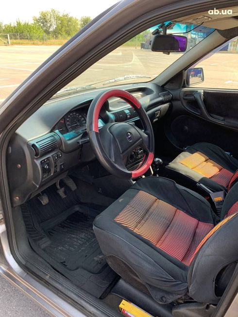 Opel Astra 1992 серый - фото 19