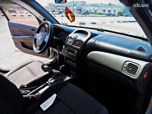 Nissan Almera 2008 - фото 17
