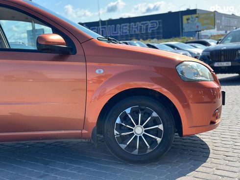 Chevrolet Aveo 2007 оранжевый - фото 11