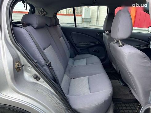 Nissan Almera 2004 - фото 11