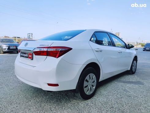 Toyota Corolla 2014 белый - фото 8