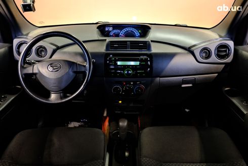 Daihatsu Materia 2009 вишневый - фото 5