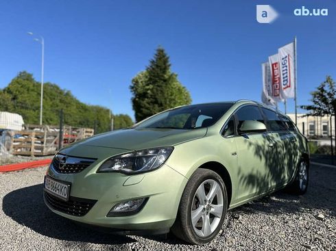 Opel Astra 2011 - фото 7