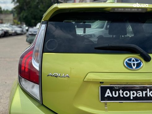 Toyota Aqua 2015 зеленый - фото 16