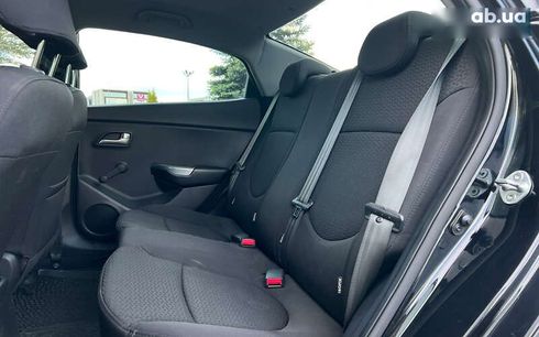 Kia Rio 2013 - фото 12