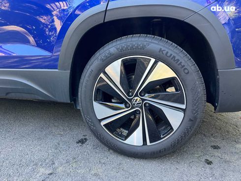 Volkswagen Taos 2023 синий - фото 13