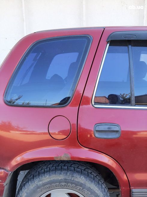 Kia Sportage 1998 красный - фото 5