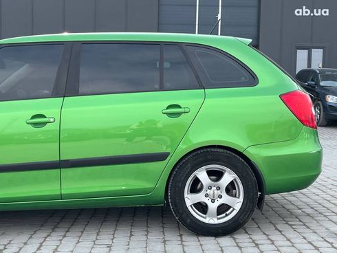 Skoda Fabia 2013 зеленый - фото 17