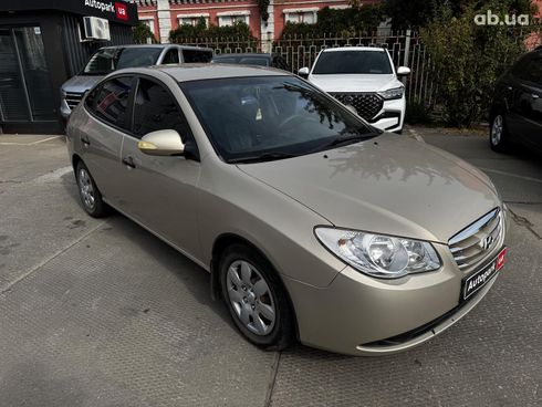 Hyundai Elantra 2010 бежевый - фото 6