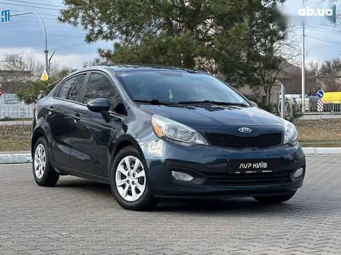 Kia Rio 2013 - фото 11