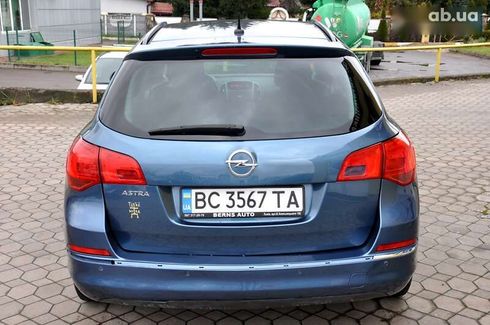 Opel Astra 2013 - фото 9