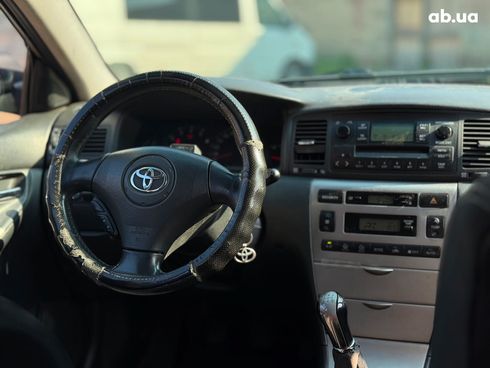 Toyota Corolla 2003 серый - фото 34