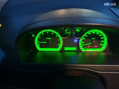 Chevrolet Aveo 2008 оранжевый - фото 4