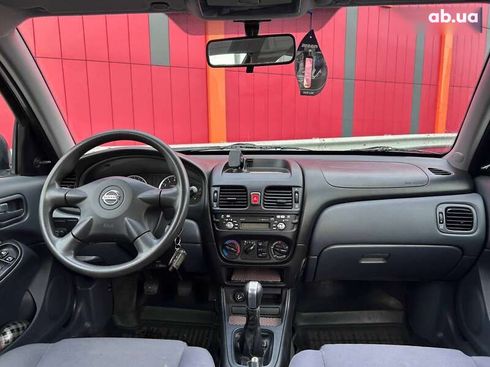Nissan Almera 2004 - фото 13