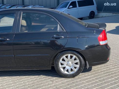 Kia Cerato 2008 черный - фото 4