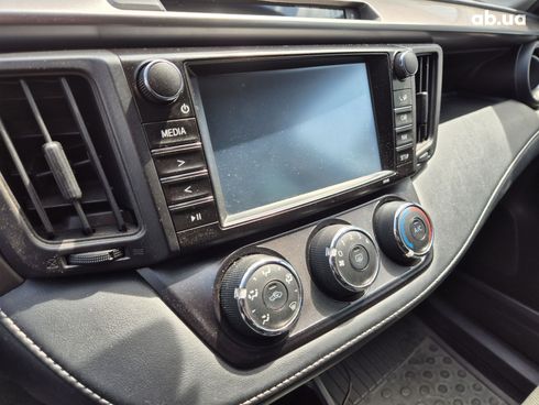Toyota RAV4 2016 голубой - фото 4