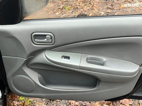 Nissan Almera 2008 черный - фото 47