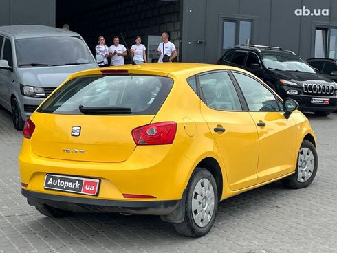SEAT Ibiza 2011 желтый - фото 7
