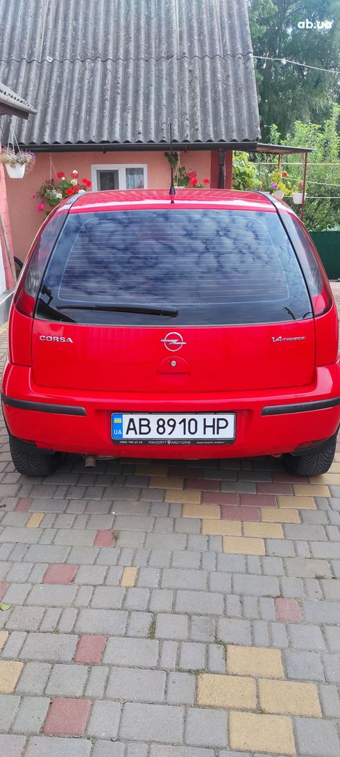 Opel Corsa 2004 красный - фото 6