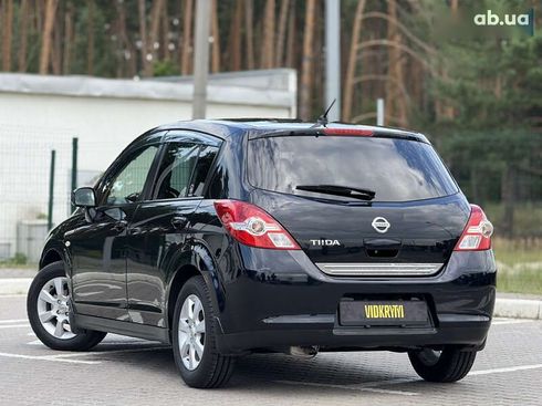 Nissan Tiida 2011 - фото 13