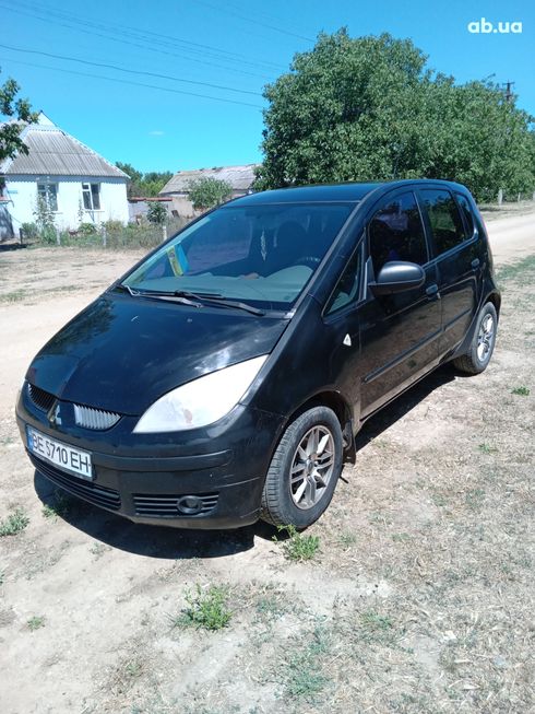 Mitsubishi Colt 2007 черный - фото 12