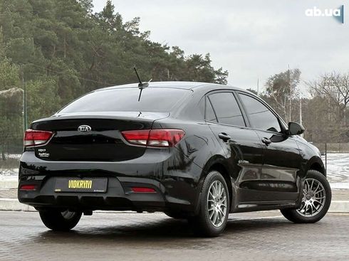 Kia Rio 2017 - фото 18