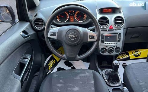 Opel Corsa 2012 - фото 14