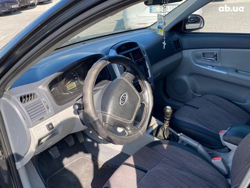 Kia Cerato 2008 черный - фото 14