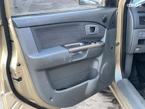 Kia Carens 2003 бежевый - фото 18