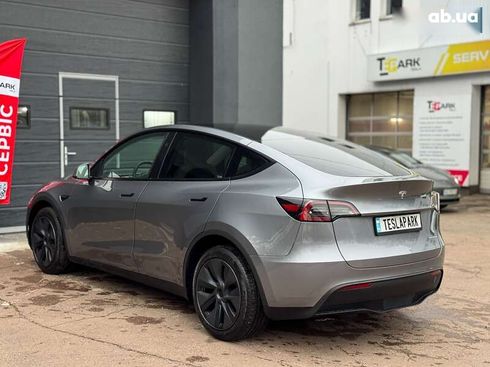 Tesla Model Y 2024 - фото 8