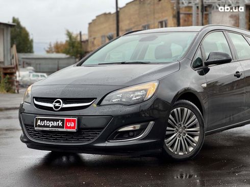 Opel Astra 2013 черный - фото 2