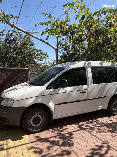 Volkswagen Caddy 2010 белый - фото 7