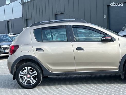 Renault Sandero 2019 бежевый - фото 30