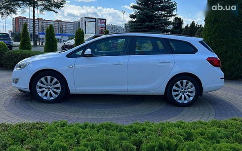 Opel Astra 2011 - фото 4
