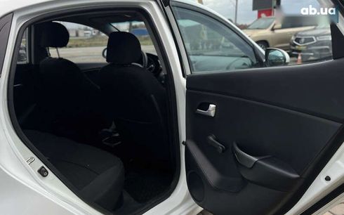 Kia Rio 2012 - фото 24