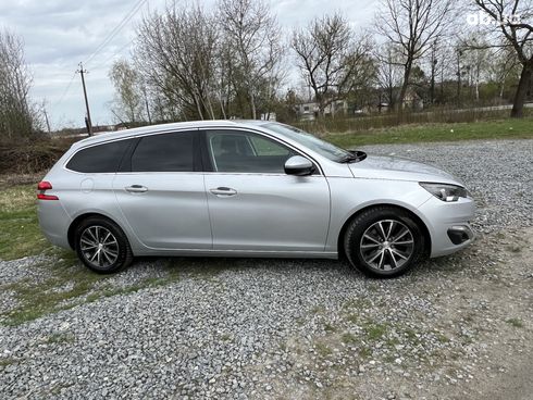 Peugeot 308 2014 - фото 9