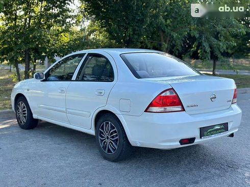 Nissan Almera 2011 - фото 7