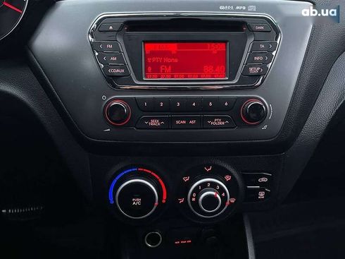 Kia Rio 2013 - фото 14