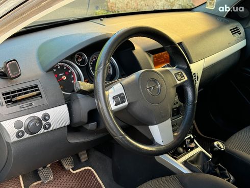 Opel Astra 2009 черный - фото 18