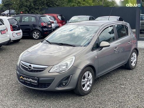 Opel Corsa 2011 - фото 9