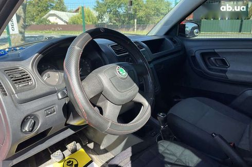 Skoda Fabia 2012 - фото 11