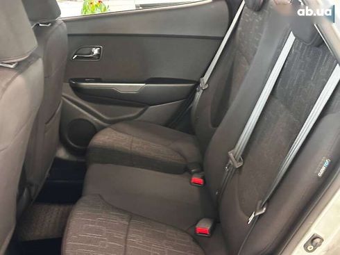 Kia Rio 2012 - фото 26