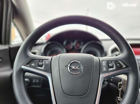 Opel Astra 2010 - фото 17