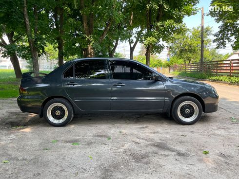 Mitsubishi Lancer 2003 черный - фото 6