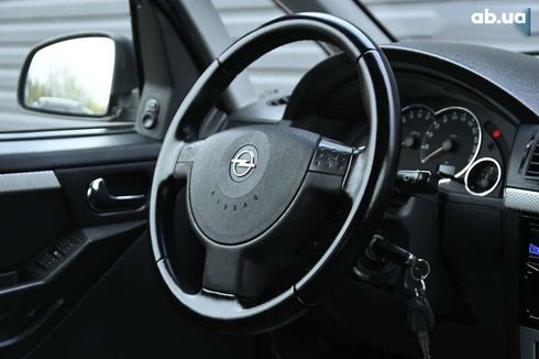Opel Meriva 2009 - фото 28