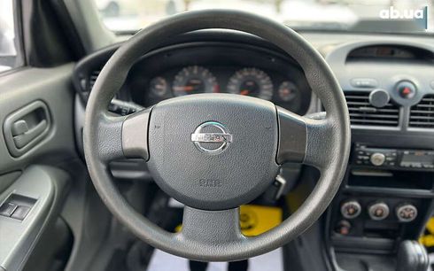 Nissan Almera 2011 - фото 10