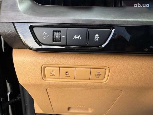 Kia Carnival 2021 - фото 11