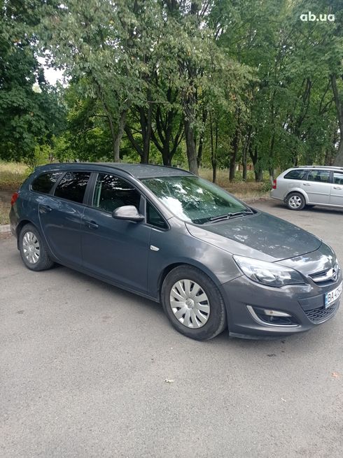 Opel Astra J 2012 серый - фото 2